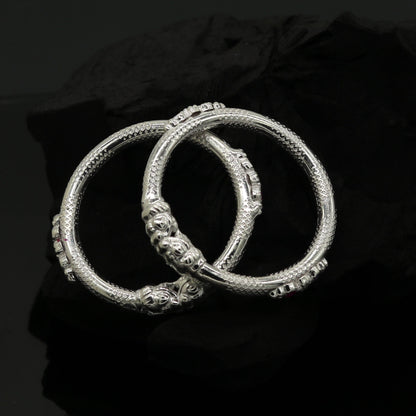 Sterling silver baby bangle bracelet with a customized elephant face design, crafted by TRIBAL ORNAMENTS for kids.