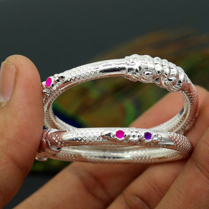 Sterling silver baby bangle bracelet with a detailed elephant face, designed for kids, by TRIBAL ORNAMENTS.