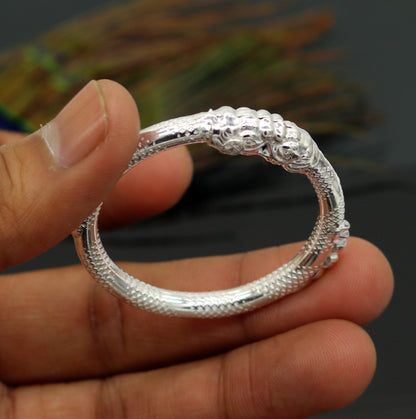 Sterling silver baby bangle bracelet with a customized elephant face design, featuring a 5mm solid sterling silver kada for kids.