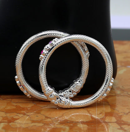 Sterling silver baby bangle bracelet with a customized elephant face design, perfect for kids, by Tribal Ornaments.