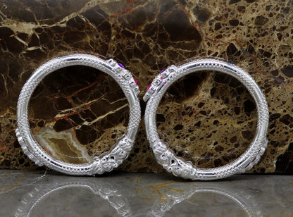 Sterling silver baby bangle bracelet with a cute customized elephant face design, ideal for kids by TRIBAL ORNAMENTS.