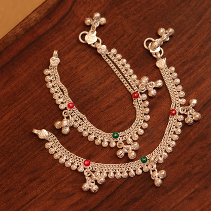 Sterling silver baby anklet with hanging noisy bells, handmade unisex ankle bracelet featuring charming foot charm from Tribal Ornaments.
