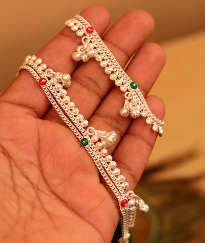 Handmade sterling silver baby anklet with hanging noisy bells and charm, unisex foot bracelet designed for infants.