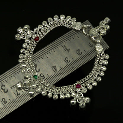 Handmade 6.2-inch sterling silver baby ankle bracelet with customizable charms, unisex design, tribal-inspired jewelry.