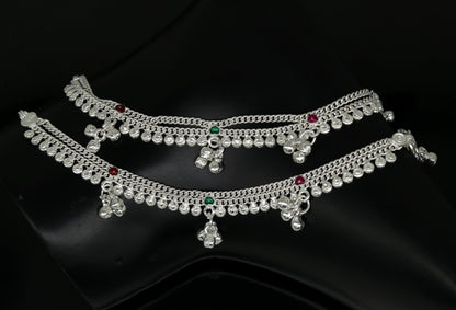 Handmade 6.2-inch sterling silver baby ankle bracelet with customized charms, unisex design, featuring tribal ornament style.