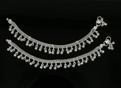 Sterling silver handmade baby anklet with hanging noisy bells, unisex baby foot charm, crafted by TRIBAL ORNAMENTS.