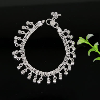 Sterling silver handmade baby anklet with hanging noisy bells and charm, unisex baby foot bracelet by Tribal Ornaments.