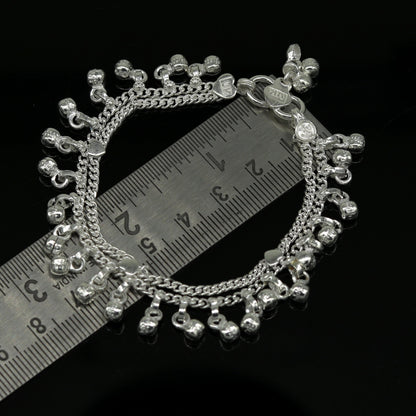 Sterling silver handmade baby anklet with hanging noisy bells, unisex baby foot bracelet, crafted by Tribal Ornaments.