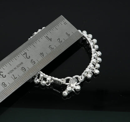 Sterling silver 6.5-inch newborn baby anklet with hanging noisy bells, unisex foot bracelet, handmade tribal ornament design.