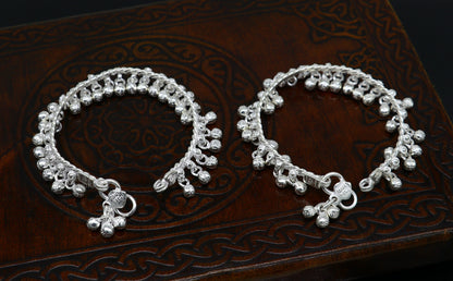Sterling silver 6.5-inch handmade newborn baby anklet with hanging noisy bells and unisex design by Tribal Ornaments.