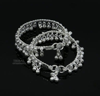 Handmade 6.5-inch sterling silver newborn baby anklet with hanging bells, unisex foot bracelet featuring charm and noise-making bells.