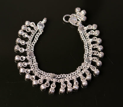 Handmade 6.5-inch sterling silver tribal anklet with jingle bells, ethnic jewelry featuring baby foot design and vintage style.
