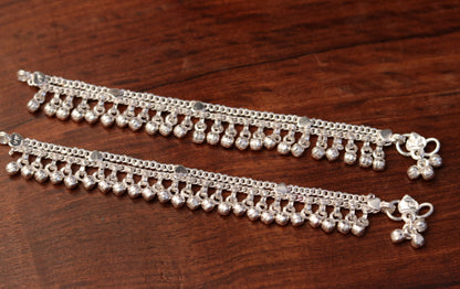 Handmade vintage sterling silver jingle bells anklets with tribal designs, featuring baby foot bracelets and ethnic Indian jewelry.
