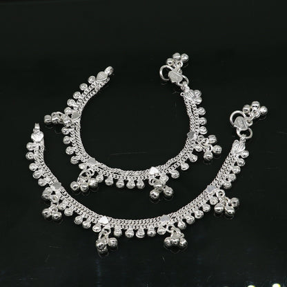 Handmade 6.5-inch sterling silver baby anklet with unisex design and customized charm, featuring a delicate foot bracelet.