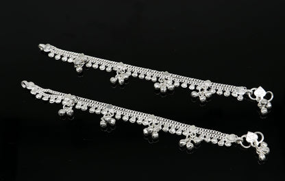 Handmade 6.5-inch sterling silver baby anklet with unisex design and customized charm, featuring intricate tribal ornament details.