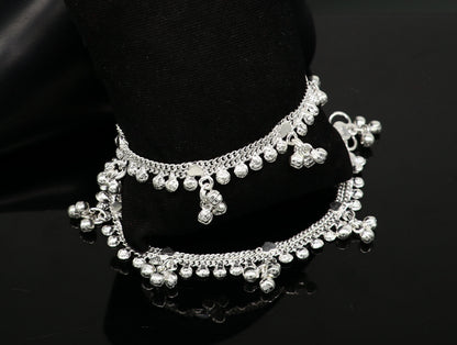 Handmade 6.5-inch sterling silver baby ankle bracelet with customized charm, unisex design, featuring delicate foot and ankle details.