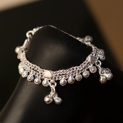 Handmade 6-inch solid silver baby anklet with jingling bells and charms, unisex baby foot bracelet by TRIBAL ORNAMENTS.