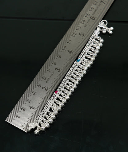 Handmade 6-inch sterling silver baby ankle bracelet with customizable charm, unisex design for newborns and kids by Tribal Ornaments.
