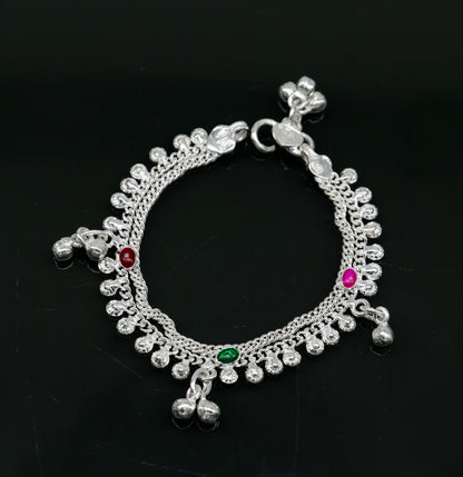 Handmade 6-inch sterling silver anklet with jingling bells, suitable for kids, featuring traditional Indian design and charming baby foot charm.