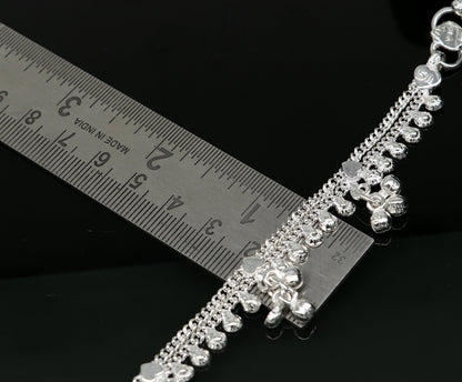 Sterling silver 6-inch handmade baby ankle bracelet with unisex design and customizable charm from TRIBAL ORNAMENTS.