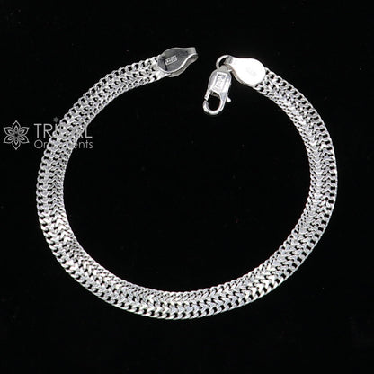 Sterling silver 6mm flat wheat chain bracelet, unisex design from Rajasthan, India, showcasing intricate craftsmanship and flexible fit.