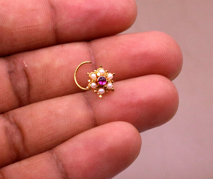 6mm white pearl and red stone Indian vintage nose pin in 20kt yellow gold with tribal-inspired handmade design.