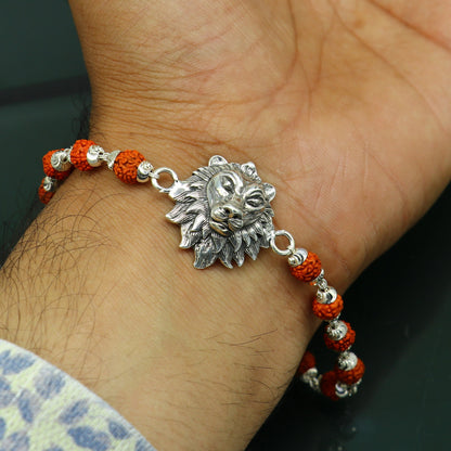 Sterling silver lion design beaded bracelet with Rudraksha beads, customized tribal ornament jewelry for Rakhi gifting.