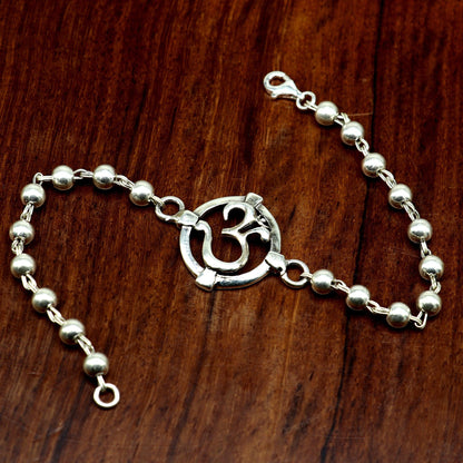 925 sterling silver OM beaded bracelet with intricate design, personalized with beaded accents, by TRIBAL ORNAMENTS.