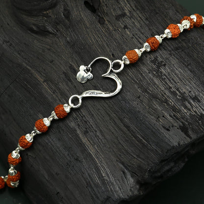 925 sterling silver Rudraksha bracelet with custom OM design, handmade tribal jewelry, 7.5 inches long, personalized tribal ornaments.