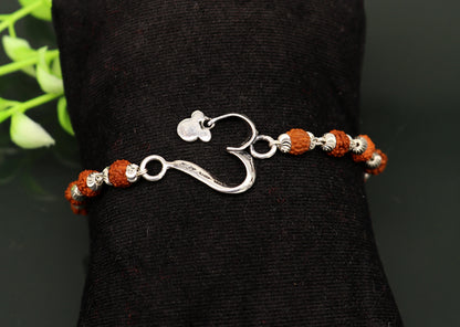 925 sterling silver Rudraksha bracelet with custom OM design, handmade tribal jewelry, 5.5-inch length, personalized gift for special occasions