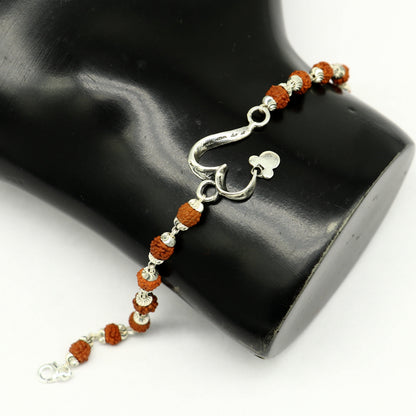 925 sterling silver Rudraksha bracelet with custom OM design, handmade tribal jewelry, 7.5-inch length, personalized tribal ornaments.