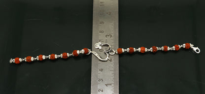 925 sterling silver Rudraksha bracelet with custom OM design, handmade tribal ornament, 7.5-inch length, personalized jewelry.