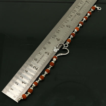 925 sterling silver Rudraksha bracelet with custom OM design, handmade tribal jewelry, 7.5 inches long, personalized gift for special occasions.