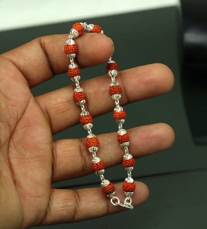 Handmade 925 sterling silver Rudraksha beads bracelet by TRIBAL ORNAMENTS, unisex jewelry with personalized customization from India.