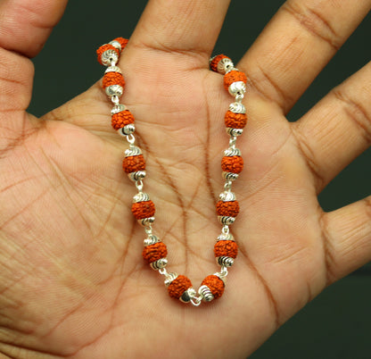 Handmade unisex Rudraksha beads bracelet in 925 sterling silver, featuring intricate design and customized for personalized gifting.