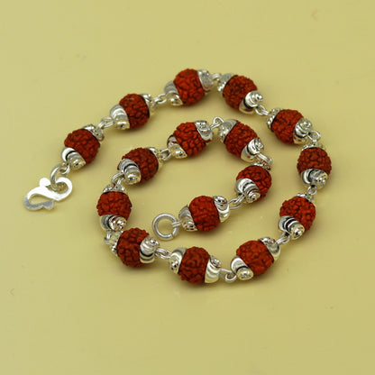 Handmade 925 sterling silver Rudraksha beads bracelet with intricate design, unisex jewelry perfect for personalized gifting from India.