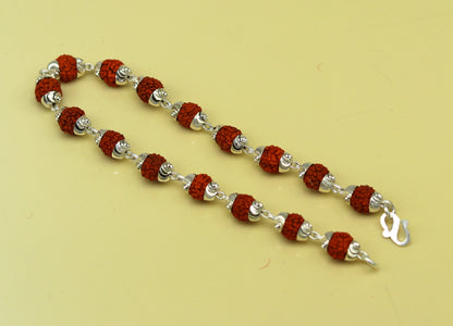 Handmade 925 sterling silver Rudraksha beads bracelet, unisex jewelry with customized design, from Tribal Ornaments.