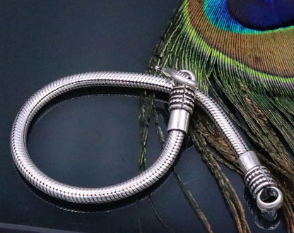 Vintage 8.5-inch handmade sterling silver snake chain bracelet from Rajasthan, unisex, flexible jewelry by Tribal Ornaments.