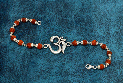 925 Sterling Silver OM Rudraksha beaded bracelet with Aum design, featuring custom beaded pattern and intricate silver details.