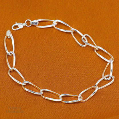 Elegant 925 sterling silver chain bracelet by TRIBAL ORNAMENTS, featuring a stylish handmade solid design for gifting or everyday wear.
