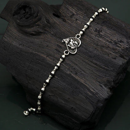 925 sterling silver Ganesha design tulsi beaded bracelet with intricate details, handcrafted by TRIBAL ORNAMENTS.