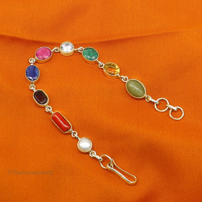 925 sterling silver Navratan stone nine-stone bracelet from Tribal Ornaments, featuring colorful stones and intricate handmade design.