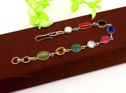 925 sterling silver Navratan stone nine-stone bracelet featuring colorful stones and intricate craftsmanship from Rajasthan, India.