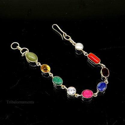 925 sterling silver Navratan stone bracelet featuring nine colorful stones, handmade tribal jewelry from Rajasthan, India.