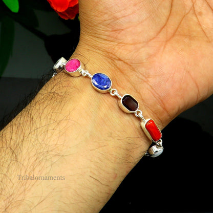 Sterling silver Navratan nine-stone bracelet with colorful gemstones, handcrafted jewelry from Rajasthan, India, stylish and elegant.