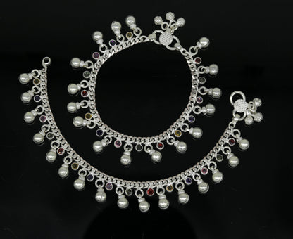 Sterling silver toddler anklet with multicolor stones, hanging noisy bells, and charm design by TRIBAL ORNAMENTS.