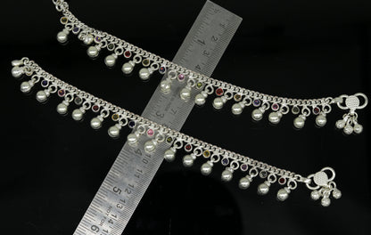 Sterling silver toddler anklet with hanging noisy bells and multicolor stones, charming ankle bracelet for young children.