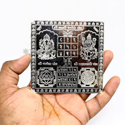 Handmade 9x9cm sterling silver Shree Lakshmi Ganesha Yantra for wealth and prosperity, crafted by Tribal Ornaments.