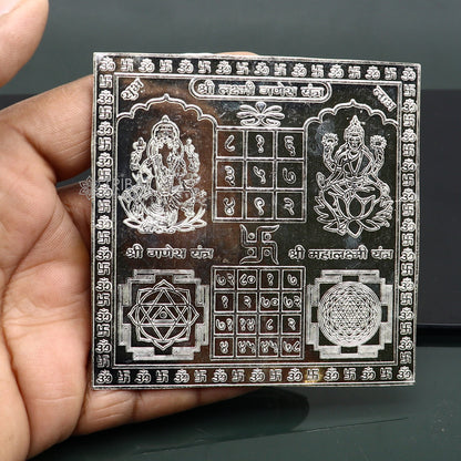 Handmade 9x9cm sterling silver Shree Lakshmi Ganesha Yantra, symbolizing wealth and prosperity for Diwali puja, by Tribal Ornaments.
