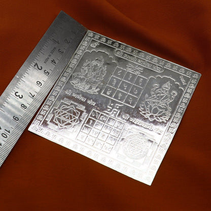 Handmade 9x9cm 925 sterling silver Shree Lakshmi Ganesha Yantra for wealth and prosperity, ideal for Diwali puja.